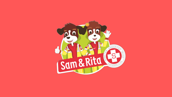 Rettungshunde Sam & Rita auf rotem Hintergrund