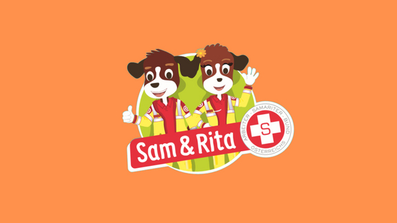 Rettungshunde Sam & Rita auf orangefarbenen Hintergrund