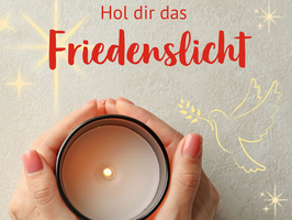 Hände halten eine Kerze