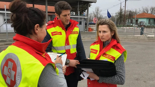 3 SA-RRT-Mitglieder bei Besprechung